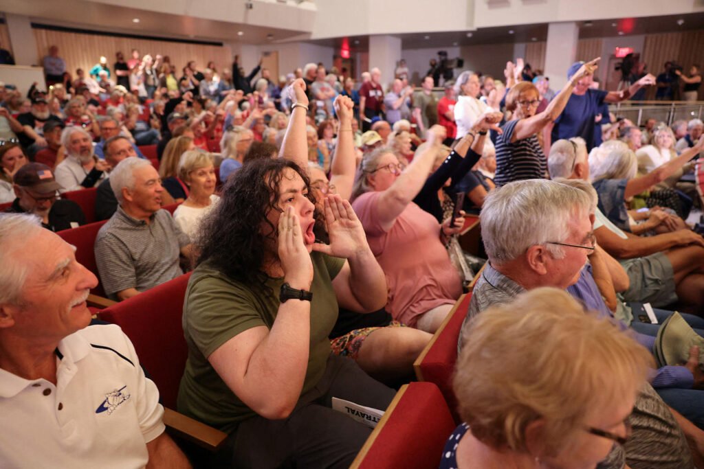 boos, jeers and angry cheers: furious constituents dominate at congressional town halls