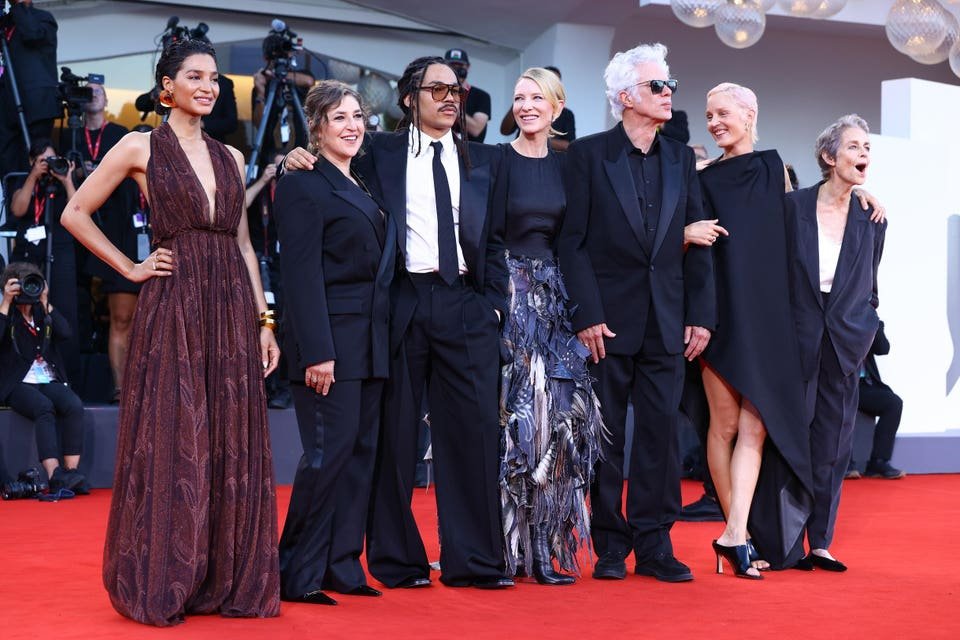 venice film festival: days of crime capers and musical legends